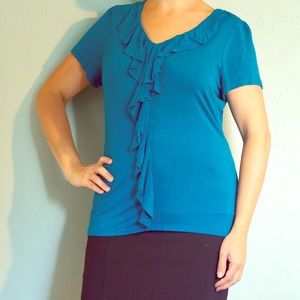 Blue top with ruffles in the middle